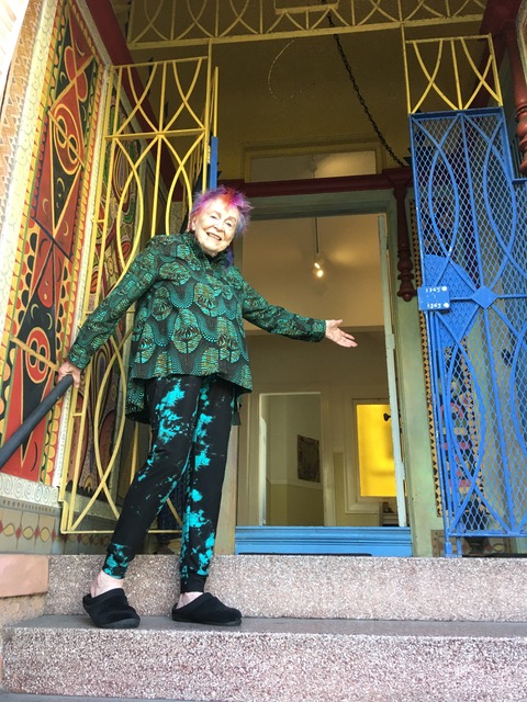 Margaret welcomes you from the steps of her Gallery